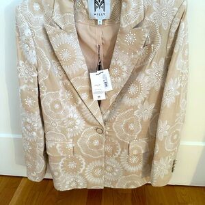 Beautiful soft pink /blush jacket . Bought at Saks fifth avenue.